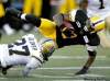 J.P. Moczulski / the canadian press
Hamilton Tiger-Cats wide receiver Arland Bruce III is taken down by Winnipeg Blue Bombers defensive back LaVar Glover.