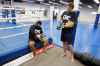 Bombers alumni Doug Brown (right) and Obby Khan deliver sage advice from their combined six trips to the school of hard knocks. (Boris Minkevich / Winnipeg Free Press files)