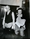 FAMILY PHOTO / WINNIPEG FREE PRESS
Winnipeg Flood Queen Julie Pawluk and her father Peter (Prokop) Pawluk both wearing hip waders in their Rover Avenue family home during the 1950 flood.