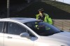 James Turner / Winnipeg Free Press 
Const. Justin Boileau speaks with a motorist RCMP pulled over on the Perimeter Highway on May 9.