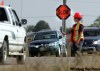 WAYNE.GLOWACKI@FREEPRESS.MB.CA
Vehicle armed with photo radar (centre) keeps an eye on traffic along a construction zone.