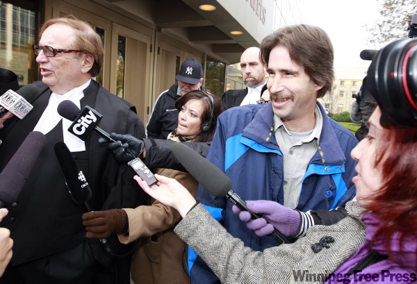 KEN GIGLIOTTI / WINNIPEG FREE PRESS
Kyle Unger (right) and his lawyer Hersh Wolch address the media after Court of Queen’s Bench Justice Glenn Joyal acquitted Unger of Brigitte Grenier's murder in 1990.