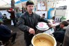 KEN GIGLIOTTI  /  WINNIPEG FREE PRESS 
Picket captain Jacques Dupont, a 31 year worker at the mill, brings pea soup to the line for fellow picketers.
