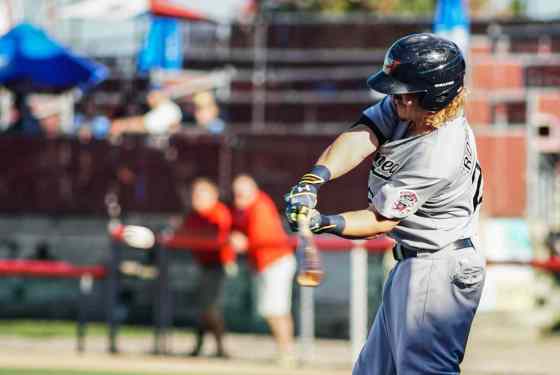Wichita EagleWinnipeg Goldeyes batter Josh Romanski drives the ball into the outfield for a double against Wichita Wingnuts pitching in the top of first inning Sunday evening at Lawrence Dumont Stadium during game 4 of the Championship series. (Sept 18th, 2016) Manny De Los Santos / Witchita Eagle