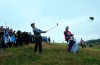 Northern Ireland's Rory McIlroy plays out of there rough on the 17th during the second round of the British Open Golf Championships at Royal Portrush in Northern Ireland, Friday, July 19, 2019.(AP Photo/Jon Super)