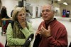 BORIS.MINKEVICH@FREEPRESS.MB.CA 
Elaine St. Hilaire and Lucien Desmarais talk to media at the Winnipeg airport after arriving back from Haiti.