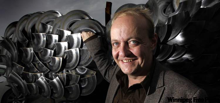 PHIL.HOSSACK@FREEPRESS.MB.CA
Ag Growth CEO Rob Stenson with a stack of grain auger blades. His Winnipeg firm paid $11.7 million for 100 per cent of Finnish firm Mepu Oy.