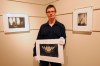 KEN  GIGLIOTTI / WINNIPEG FREE PRESS files
Bruce Monk holds a photo from a show at Mayberry Fine Art in 2010.