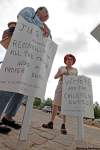 JOE.BRYKSA@FREEPRESS.MB.CA
Louis Halama, right, with residential school survivor Chantelle Devillier and supporters at a small protest at The Forks.