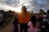 RUTH.BONNEVILLE@FREEPRESS.MB.CA
Residential school survivor Martin Tuesday of Sioux Lookout, Ont., holds his grandchildren close while attending the TRC concert Wednesday evening.