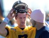 Joe Bryksa/Winnipeg Free Press
Bombers QB Alex Brink confers with injured QB Buck Pierce on Wednesday.