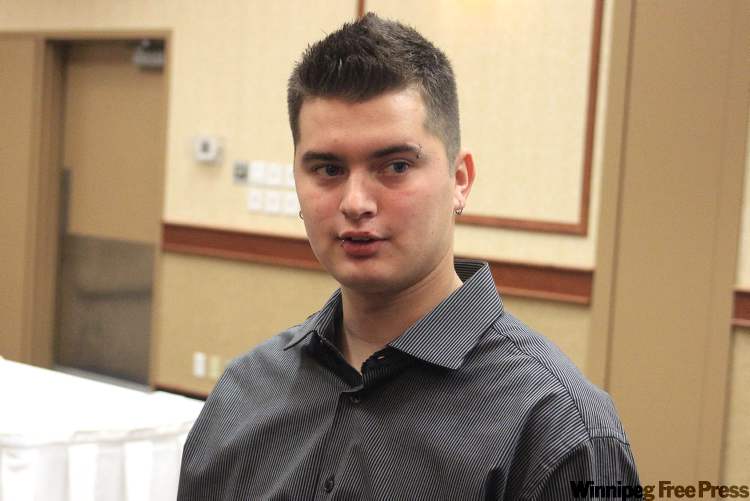 MIKE DEAL / WINNIPEG FREE PRESS
Jordan Dubois talks to the media after the memorial service for his parents Marcel and Brenda Dubois at the Victoria Inn.