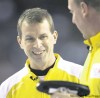 Nathan Denette / the canadian press
Manitoba skip Jeff Stoughton (left) shares a laugh with lead Steve Gould while playing against Quebec in Friday's tiebreaker.