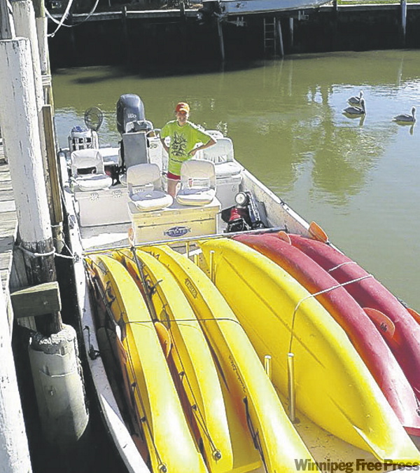 KEVIN ROLLASON / WINNIPEG FREE PRESS
Gail MacAulay and the kayak-filled motorboat ready to whisk us out on our Everglades eco tour.