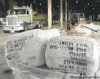 Michael Vosburg / Forum of Fargo-moorhead
Bundles of bags ready to fill with sand sit in Fargo city garage.