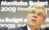 MIKE APORIUS / WINNIPEG FREE PRESS 
Finance Minister Greg Selinger avoided a deficit by cutting this year's debt payment by $90 million and withdrawing $110 million from the rainy-day fund.