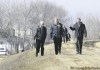 RUTH BONNEVILLE / WINNIPEG FREE PRESS
Prime Minister Stephen Harper, with MP Vic Toews (left) and Premier Gary Doer, walks along the Morris dike during a visit to Manitoba Tuesday.