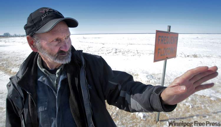 MIKE.DEAL@FREEPRESS.MB.CA
Inwood farmer John Dyck says the road that goes by his farmstead has washed out every spring for the last few years. This is due to flooding of the nearby Shoal Lakes.