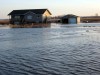 Submitted
Water surrounds Pat McKenzie’s home in the RM of Cornwallis, southeast of Brandon, on Thursday. Overland flooding has forced 22 people in the Westman area to evacuate.