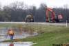 JOE.BRYKSA@FREEPRESS.MB.CA
Crews prepare to make the 'Hoop and Holler Cut,' a deliberate breach in Assiniboine dike southeast of Portage la Prairie.