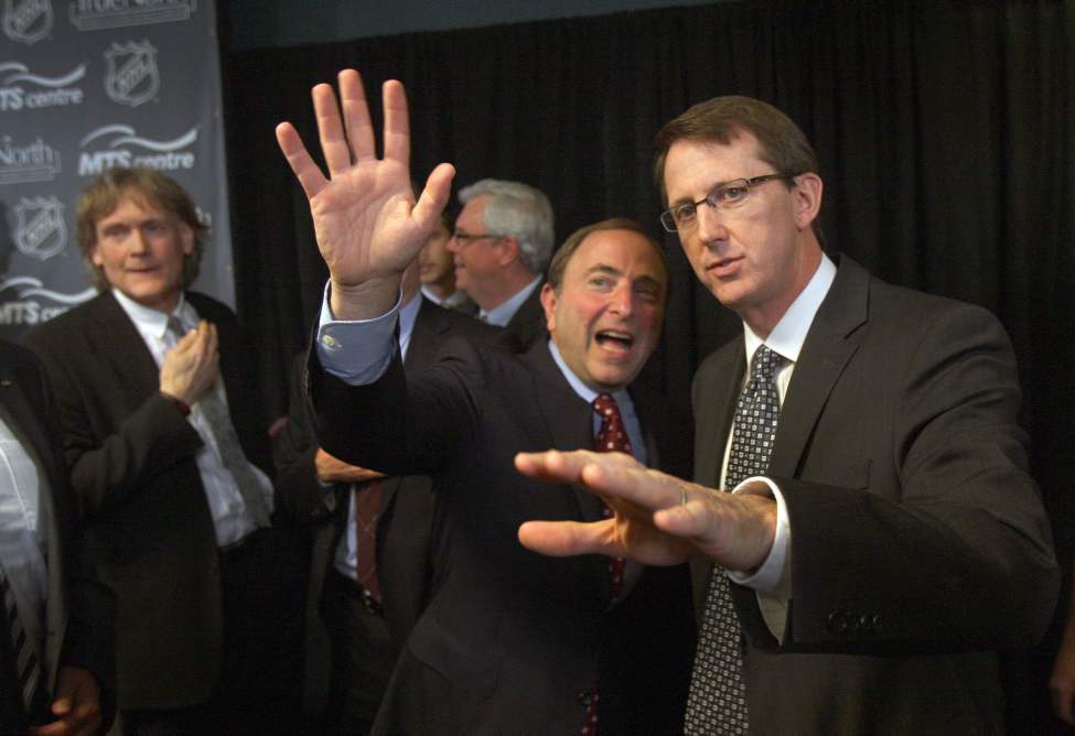 JOE BRYKSA / WINNIPEG FREE PRESS
Mark Chipman of True North Sports and Entertainment LTD , right, with NHL commissioner Gary Bettman, centre, and David Thomson after the announcement of the NHL is returning to Winnipeg.