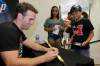 JOHN WOODS / WINNIPEG FREE PRESS
Winnipeg Jets captain Andrew Ladd signs autographs for Breydon and Shealynn Stubs on Friday.