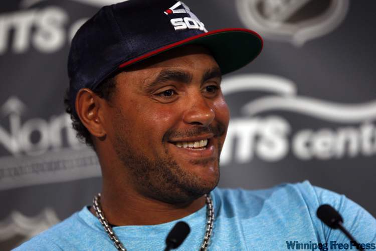 KEN GIGLIOTTI / WINNIPEG FREE PRESS
Dustin Byfuglien addresses questions about his weight and legal problems on Friday at MTS Centre.