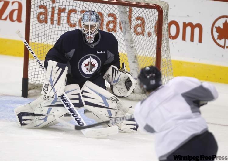 TREVOR HAGAN/WINNIPEG FREE PRESS
Winnipeg Jets' goaltender Chris Mason, seen during practice last week, was not at practice today as his wife is about to have a baby.