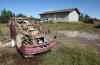 Joe Bryksa / Winnipeg Free Press
The front yard of a home on the St. Theresa Point First Nation is seen in a file photo.  It's not uncommon to have up to 18 people sharing a three-bedroom bungalow on the reserve, says Chief David McDougall.