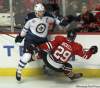 JOE BRYKSA / WINNIPEG FREE PRESS
Jets captain Andrew Ladd (above left) and his linemates Bryan Little and Blake Wheeler have been held pointless in two games so far.