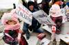 TREVOR HAGAN / WINNIPEG FREE PRESS
Twins Olivia, left, and Katelyn Stein, 2, with their uncle, Jeffrey Kohut, during the Occupy Winnipeg protest in front of the Manitoba Legislative Building.