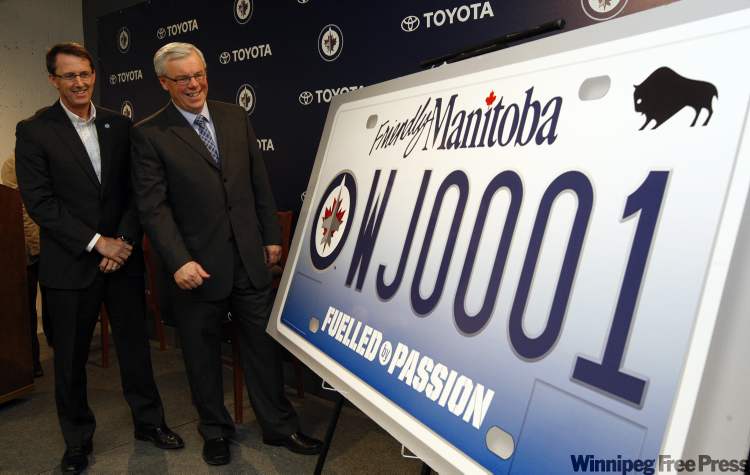 KEN GIGLIOTTI / WINNIPEG FREE PRESS
Winnipeg Jets licence plates were unveiled Tuesday at the MTS Centre by Mark Chipman (left) and Premier Greg Selinger.
