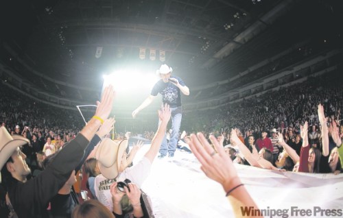 WINNIPEG FREE PRESS ARCHIVES
Brad Paisley (top) New Kids on the Block, Eagles and Nickelback have all graced the stage so far this year.