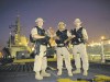 Cpl. Rick Ayer, Formation Imaging Services
Members of HMCS Winnipeg's naval boarding party look out over Karachi Harbour, Pakistan, last month.