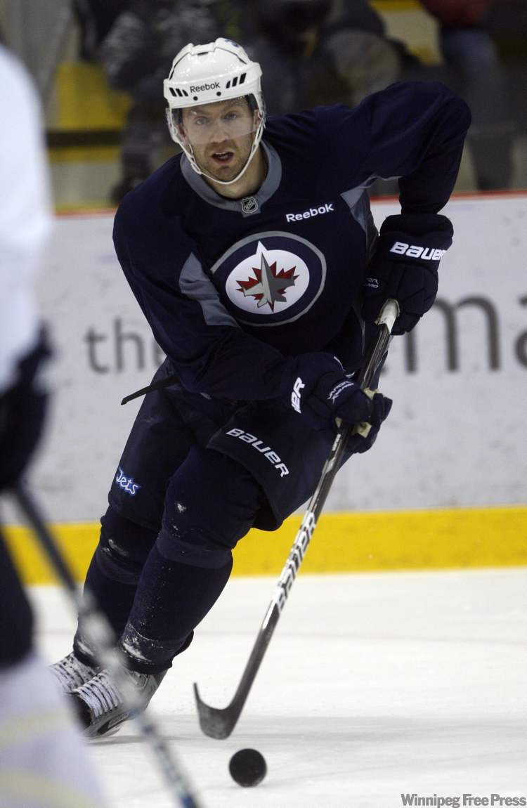 KEN GIGLIOTTI / WINNIPEG FREE PRESS
Eric Fehr prepares for the Jets' next game against Montreal during practice at the MTS Iceplex Tuesday.