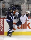 MIKE DEAL / FREE PRESS ARCHIVES
Patrice Cormier puts a hit on Florida Panthers' Kris Versteeg last season.