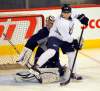 Boris Minkevich / Winnipeg Free Press
FILE - Jets goalie Ondrej Pavelec defends the net as Jets Antti Miettinen tries to deflect the puck past him during the Winnipeg Jets pre-game skate at the MTS Centre.
