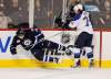 TREVOR HAGAN / WINNIPEG FREE PRESS
The Winnipeg Jets' Jim Slater (19) is knocked over by St. Louis Blues' T.J. Oshie (74) during first period NHL action at the MTS Centre, Saturday.