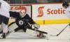 Mike Deal / Winnipeg Free Press
Winnipeg Jets goaltender Chris Mason (50) goes for full extension to stop a puck during practice at MTS Centre Tuesday morning.