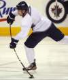New Winnipeg Jet Grant Clitsome hits the ice during morning practice Wednesday at the MTS Centre in Winnipeg. Whether he plays with the team against the Florida Panthers Thursday will be a game-time decision, says coach Claude Noel.