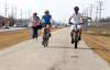 BORIS MINKEVICH / WINNIPEG FREE PRESS
Joelle Allard and Jonathan Sirois ride their bikes on the Greenway trail in East Kildonan.