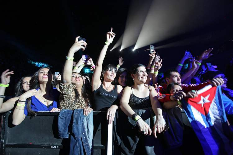 Ruth Bonneville / Winnipeg Free Press
The crowd enjoys Pitbull Saturday at the MTS Centre.