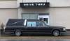 Joe Bryksa / Winnipeg Free Press
A hearse waits at the Kentucky Fried Chicken outlet drive-through at Notre Dame Avenue and Sherbrook Street in March 2012.