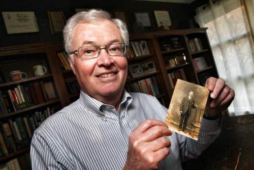Mike Deal / Winnipeg Free Press
Winnipeg Foundation CEO Rick Frost with a photo of his grandfather, who was sent to Canada at age 12. 
