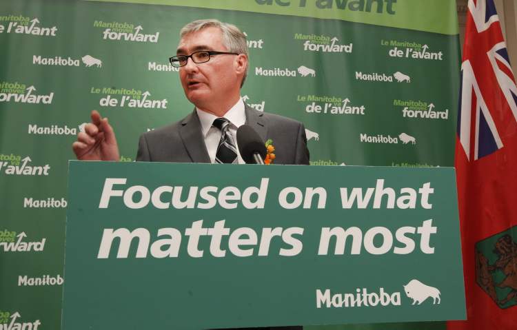 JOE BRYKSA / WINNIPEG FREE PRESS
Finance Minister Stan Struthers speaks with reporters about the 2012 Manitoba Budget in the lockup before his budget speech at the Manitoba Legislature Tuesday.