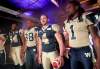 MIKE DEAL / WINNIPEG FREE PRESS
The Winnipeg Blue Bombers unveiled their new jerseys today at the Pan Am Boxing Club in Winnipeg's Exchange District.  From left: Chris Greaves (64), Marcellus Bowman (38), Buck Pierce (4), Perry Floyd (1).