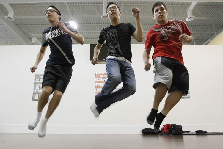 JOHN WOODS / WINNIPEG FREE PRESS
From left, Sagkeeng's Finest (Dallas and Brandon Courchene and Vincent O'Laney) rehearse before they head out to compete in the finale of Canada's Got Talent.