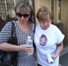 Joe Bryksa/Winnipeg Free Press
Tim McLean’s mother, Carol de Delley,right, is consoled by her sister, Linda Lamirande, after speaking outside Manitoba Law Courts on Monday afternoon.