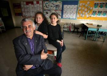 Phil Hossack / Winnipeg Free Press
‘Albert’ El Tassi with granddaughters Aiche Tassi, and Hiba Souid at the Muslim school he helped create. When El Tassi arrived in Winnipeg, there were just 10 Muslim families in Winnipeg. Today, there are 15,000 Muslims in Manitoba.