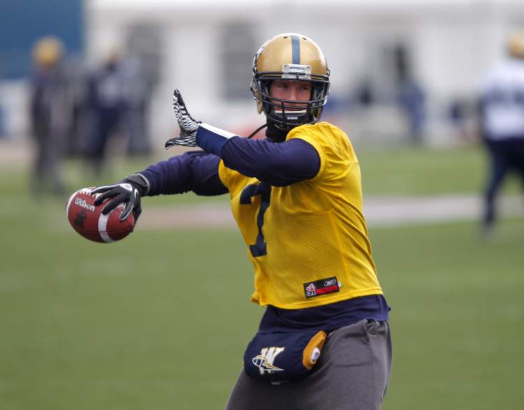 Boris Minkevich / Winnipeg Free Press Archives
The Winnipeg Blue Bombers Alex Brin' practises at the stadium.